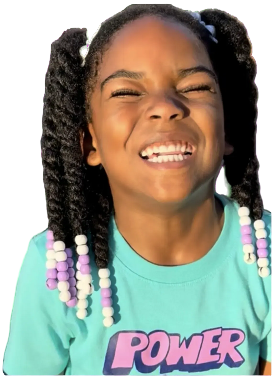 Child wearing Flexiebeads silicone hair beads